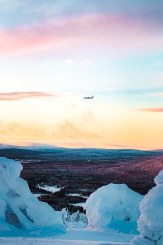 Lentokone Levi luminen maisema värikäs taivas